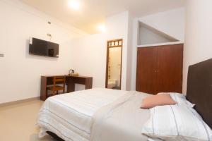Μια τηλεόραση ή/και κέντρο ψυχαγωγίας στο Casa Terra Residencial