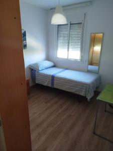 Postel nebo postele na pokoji v ubytování Habitación privada en Rincón
