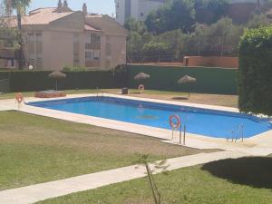 Bazén v ubytování Habitación privada en Rincón nebo v jeho okolí