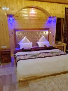 Postel nebo postele na pokoji v ubytování Nubra House