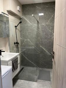 Kúpeľňa v ubytovaní Gréta Lux Apartman + 21 fotografií