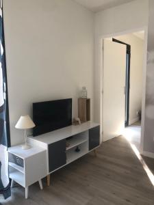 TV a/nebo společenská místnost v ubytování My cosy mobil-home + 12 fotografií