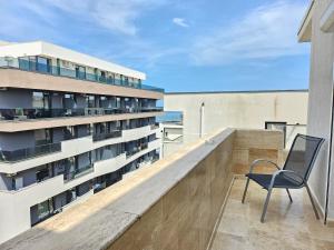 En balkon eller terrasse på Luxury Mamaia Nord