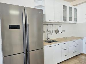 Køkken eller tekøkken på Luxury Mamaia Nord