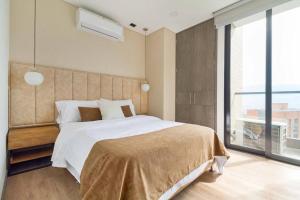 Ένα ή περισσότερα κρεβάτια σε δωμάτιο στο The place you need in Poblado-Medellin 1103 +12 φωτογραφίες