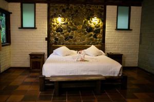 Cama o camas de una habitación en Arrayan y Piedra