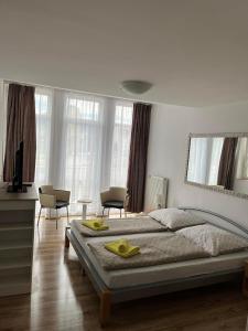 Postel nebo postele na pokoji v ubytování Hotel Palazzo