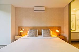 Ένα ή περισσότερα κρεβάτια σε δωμάτιο στο Ideal place in el Poblado, Medellin +20 φωτογραφίες