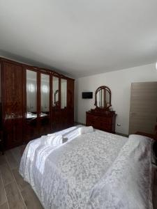 Postel nebo postele na pokoji v ubytování Il Pergolato + 4 fotografie