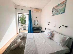 Postel nebo postele na pokoji v ubytování Hotel Liliana