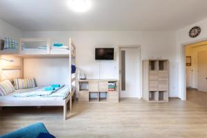 Postel nebo postele na pokoji v ubytování Apartmán "U nás doma" v chatě ALFA Černý Důl
