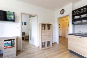 Kuchyň nebo kuchyňský kout v ubytování Apartmán "U nás doma" v chatě ALFA Černý Důl