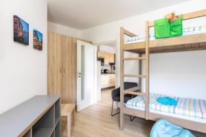 Postel nebo postele na pokoji v ubytování Apartmán "U nás doma" v chatě ALFA Černý Důl
