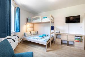 Postel nebo postele na pokoji v ubytování Apartmán "U nás doma" v chatě ALFA Černý Důl + 37 fotografií