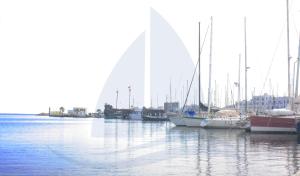 a group of boats docked in a harbor at Marina Cap Monastir- Appart'Hôtel in Monastir