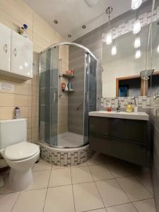 Kúpeľňa v ubytovaní Apartament Śliwka na Monte