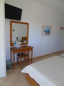 Postel nebo postele na pokoji v ubytování Studios - Nostos