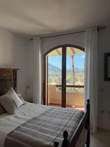 Postel nebo postele na pokoji v ubytování Charming Villa in La Manga Club