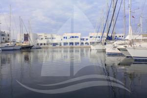 a group of boats are docked in a harbor at Marina Cap Monastir- Appart'Hôtel in Monastir