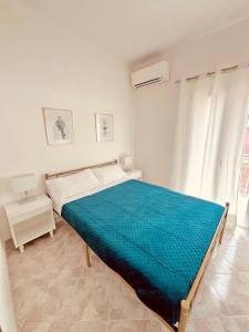 Katil atau katil-katil dalam bilik di Sicily Apartment 3 - BLUE WAVES