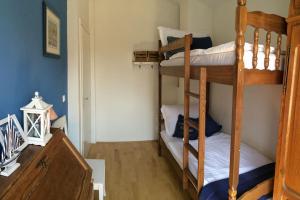 a bedroom with two bunk beds in a room at House Lavanda in Njivice