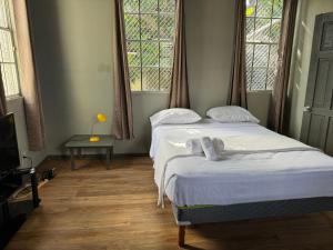 Postel nebo postele na pokoji v ubytování JJ Guest House