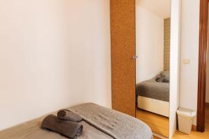 Een bed of bedden in een kamer bij Casa Riad met Privé Patio