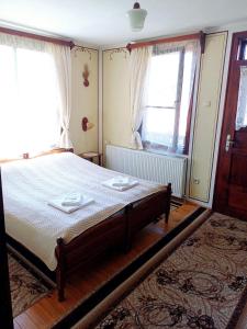 Postel nebo postele na pokoji v ubytování Guest Rooms Dona