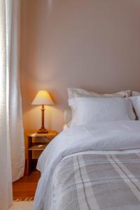 Cama ou camas em um quarto em Zur Suítes