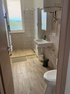 Koupelna v ubytování Primo Apartman