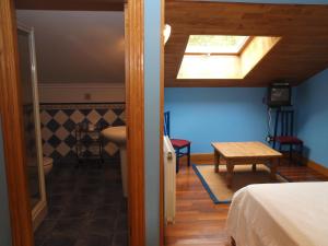 Postel nebo postele na pokoji v ubytování Hostal Rural Onbordi