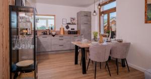 Kuchyň nebo kuchyňský kout v ubytování Eggert Alm Apartments
