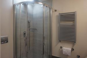 Koupelna v ubytování Trevi Palace Luxury Inn