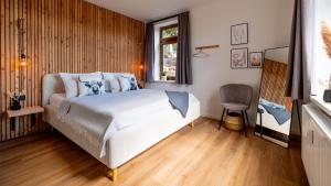 Postel nebo postele na pokoji v ubytování Eggert Alm Apartments