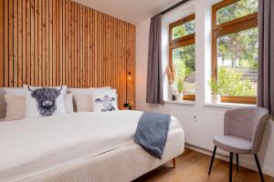Postel nebo postele na pokoji v ubytování Eggert Alm Apartments