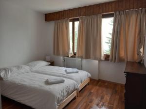 Postel nebo postele na pokoji v ubytování Auberge de l'Ours