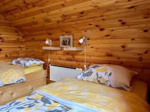 Ένα ή περισσότερα κρεβάτια σε δωμάτιο στο Durmitor Home with Sauna