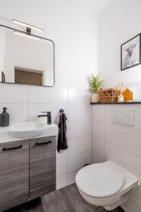 Koupelna v ubytování Eggert Alm Apartments + 32 fotografií