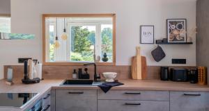 Kuchyň nebo kuchyňský kout v ubytování Eggert Alm Apartments