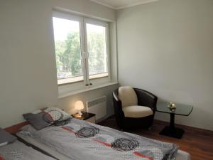 Łóżko lub łóżka w pokoju w obiekcie Apartment in Mi dzyzdroje near Sandy Beach