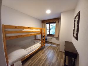 Postel nebo postele na pokoji v ubytování Auberge de l'Ours