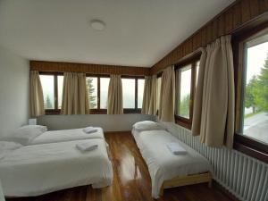 Postel nebo postele na pokoji v ubytování Auberge de l'Ours
