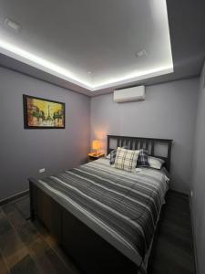 Ένα ή περισσότερα κρεβάτια σε δωμάτιο στο Premier Apartment Ensenada