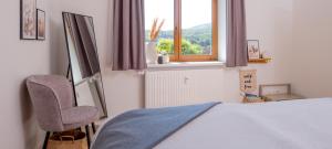 Postel nebo postele na pokoji v ubytování Eggert Alm Apartments