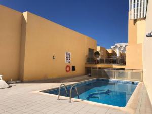 Bazén v ubytování La Perla Playa Apt Dream Homes Tenerife nebo v jeho okolí