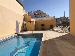 The swimming pool at or close to La Perla Playa Apt Dream Homes Tenerife