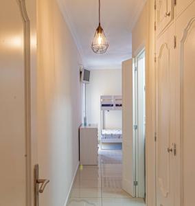 A bed or beds in a room at La Perla Playa Apt Dream Homes Tenerife