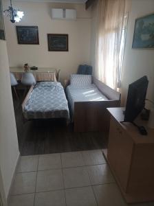 Posteľ alebo postele v izbe v ubytovaní Meteora quiet house
