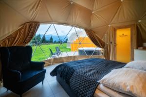 Postel nebo postele na pokoji v ubytování Diamond Glamp & Jacuzzi