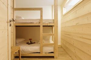 Posteľ alebo postele v izbe v ubytovaní Résidence Grand Roc - Ancolies 216 - Happy Rentals